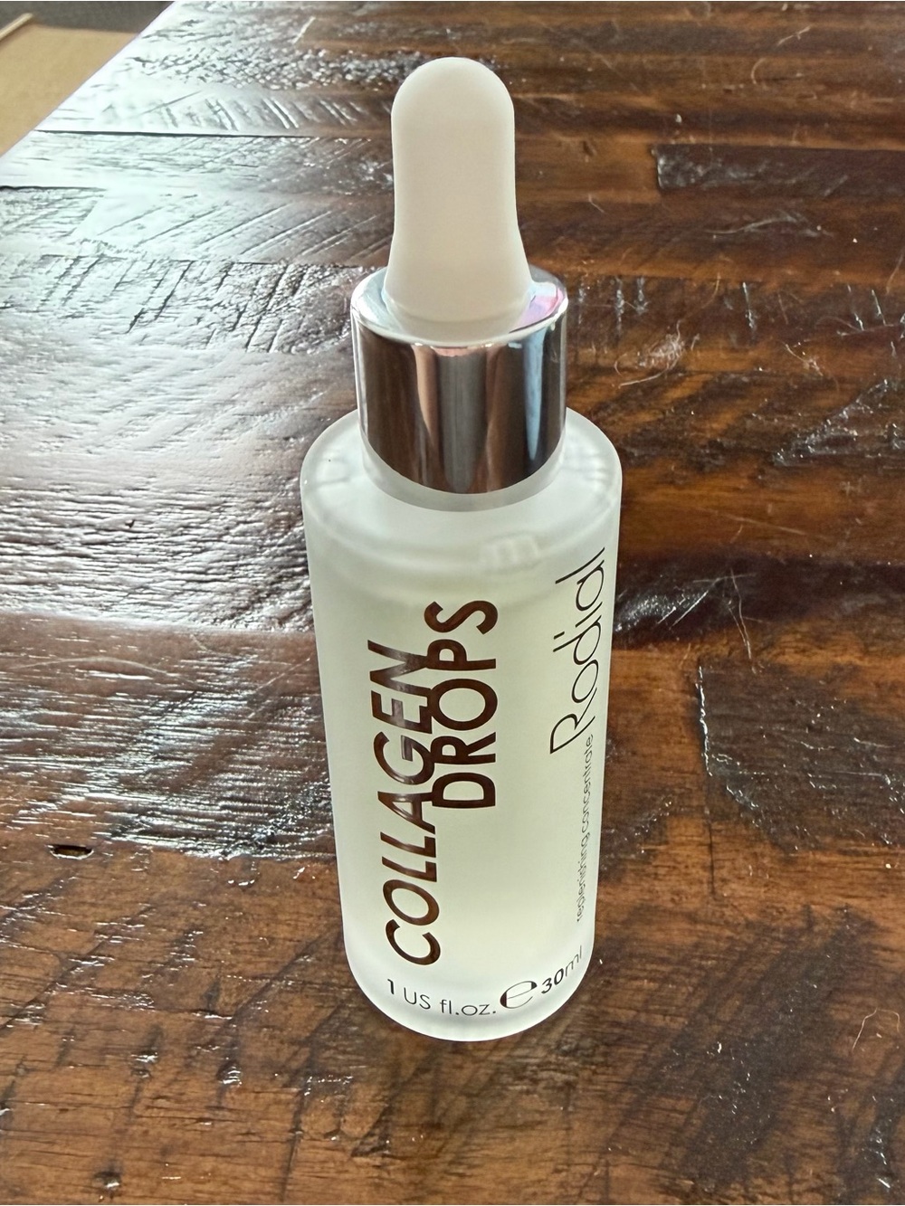 Rodial Collagen Drops Serum in Frosted White Bottle with Silver Cap